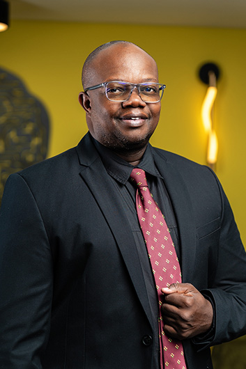 Mr. Kazembire Zemburuka - Member of the Management Commitee of the Bank