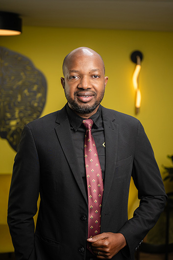 Mr. P. Tshiningayamwe - Member of the Management Commitee of the Bank